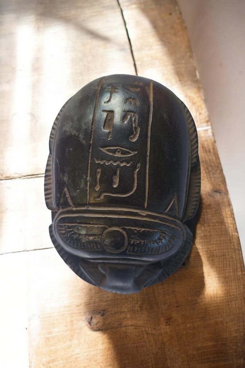 hand-carved scarab beetle paperweight