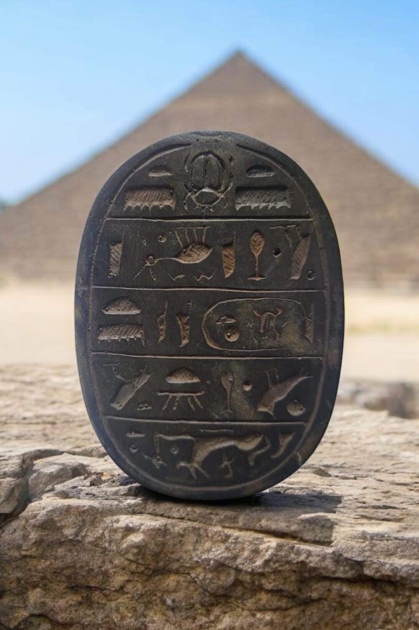 hand-carved scarab beetle paperweight